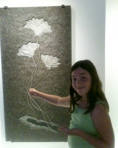 Elizabeth with flower fossils.