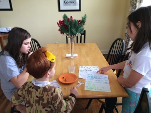 examining the remnants of Santa's visit - notice the safety goggles